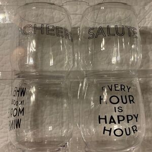 Set of four plastic clear with graphics wine glasses